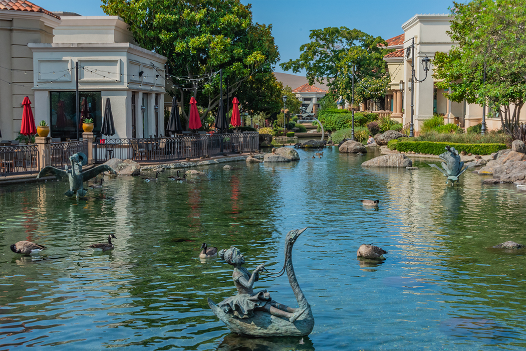 Swan-shaped fountain at a shopping center